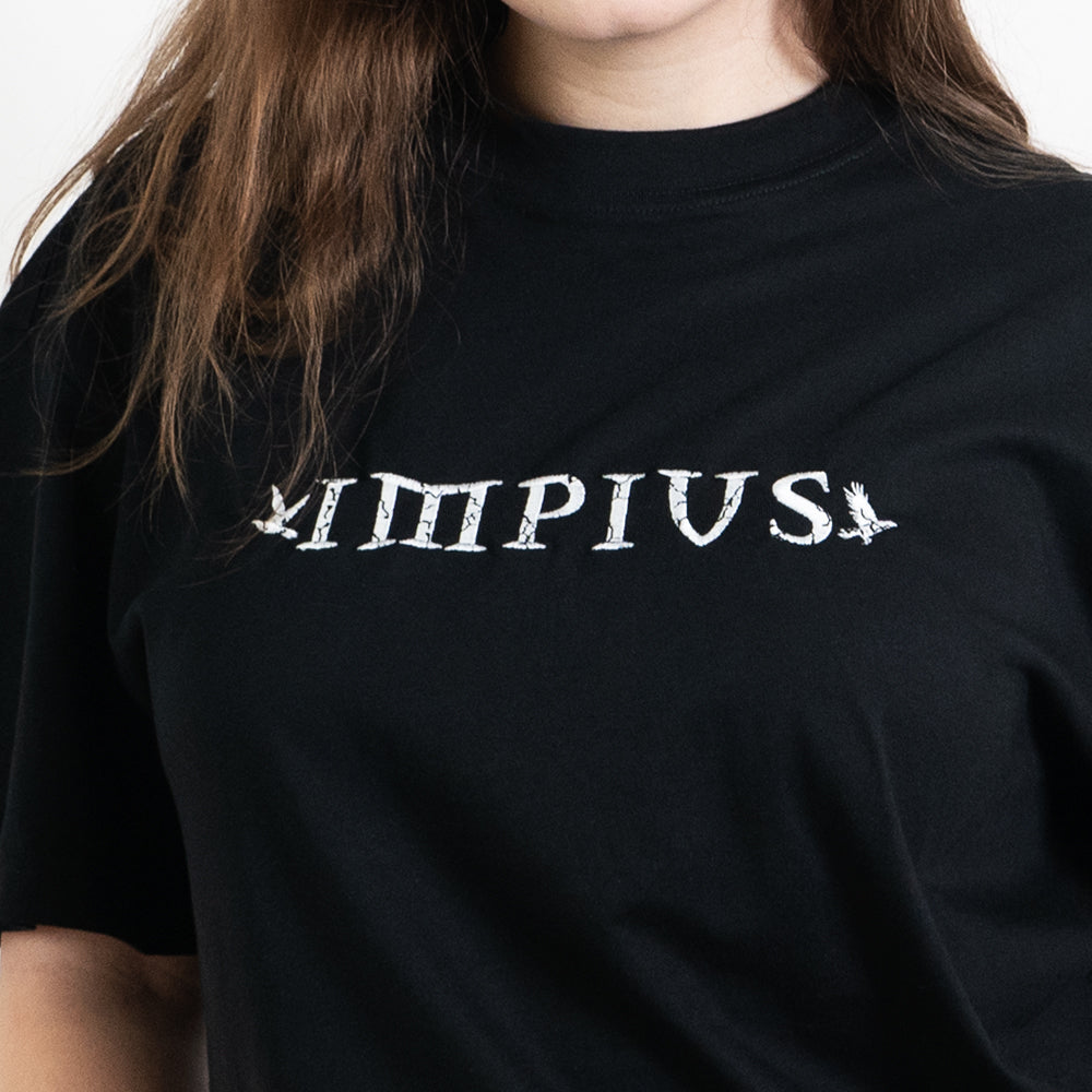 A close up image of the impius logo on a black oversized tee
