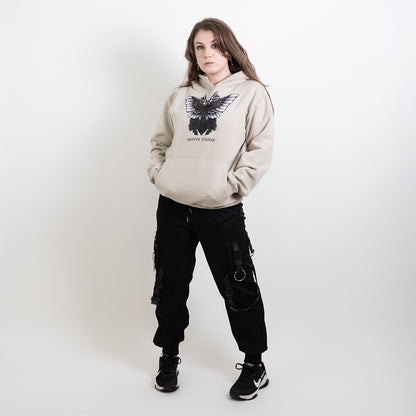 A full body image of an alternative model wearing stone hoodie with the impius death moth design