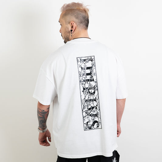 Alternative model wearing a white oversized tee with the impius cherry blossom back design