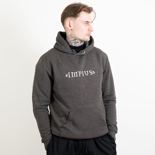 Tatooed model wearing a grey hoodie with the Impius logo