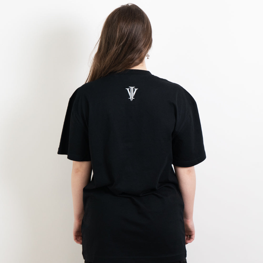 Alternative model wearing a black oversized tee showing the back impius logo
