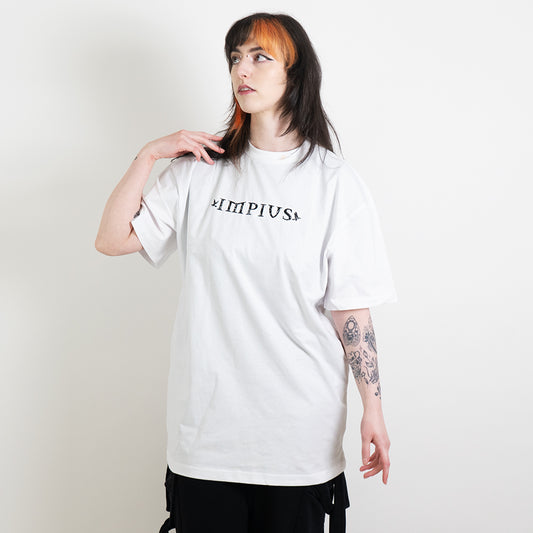 Alternative model wearing a white oversized tee with the impius logo